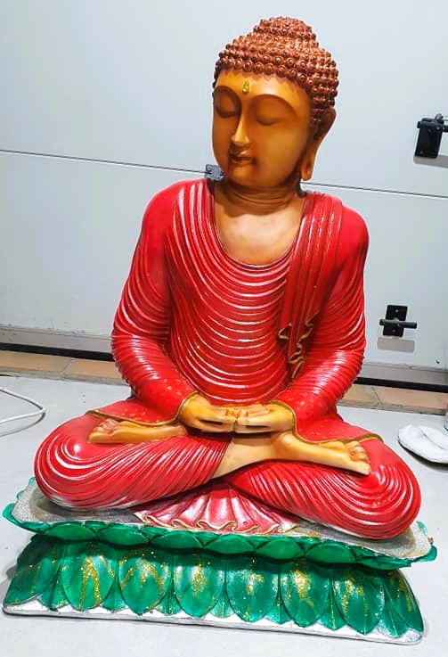 Création Boudha qui tourne la tête.